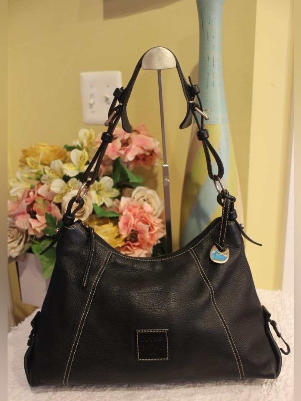 Dooney & Bourke black East West Pebbled leather Sloch shoulder bag